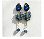 Teardrop-shaped gemstone earrings with multi-layered crystal beads and long tassel design
