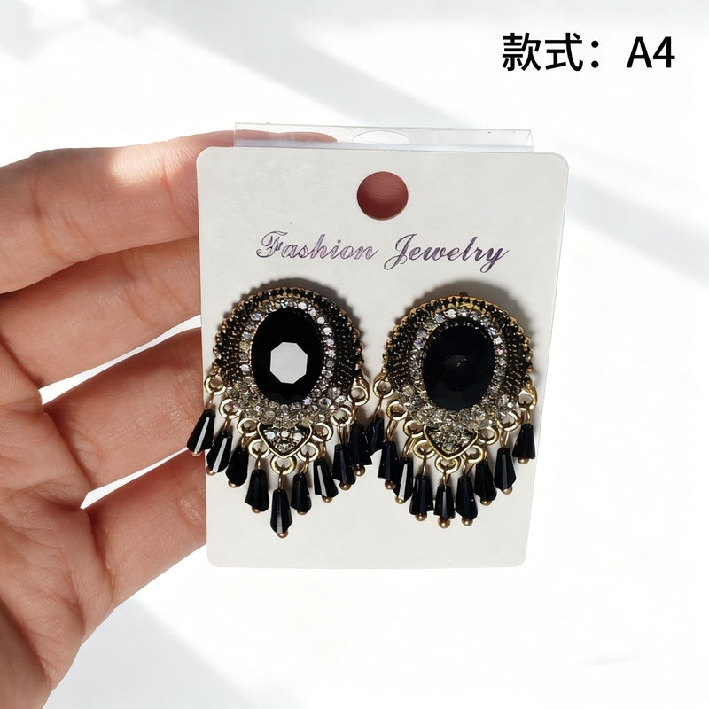Bohemian style earrings with glass tassels, exaggerated and stylish