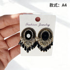Bohemian style earrings with glass tassels, exaggerated and stylish
