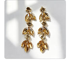 Leaf-shaped colorful diamond long earrings marquise-shaped rhinestones, suitable for pairing with dresses, creating a light and luxurious atmosphere