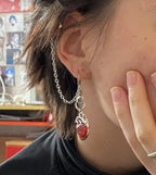 Dark-style jewelry: vintage pendant earrings, horn-shaped ruby earrings