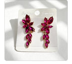 Gilt and diamond-encrusted floral earrings, long earrings for a French elegant style photo shoot or date