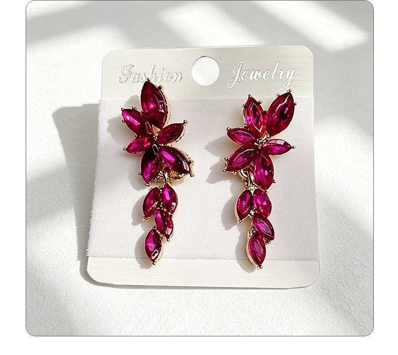 Gilt and diamond-encrusted floral earrings, long earrings for a French elegant style photo shoot or date
