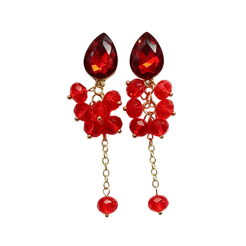 Teardrop-shaped gemstone earrings with multi-layered crystal beads and long tassel design