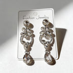 Luxurious floral with full diamond accents, long waterdrop gemstone earrings, court-style versatile earrings that enhance complexion