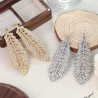 Fashionable feather for women, European American exaggerated retro cool style, stylish and unique hip-hop diamond-embellished leaf earrings