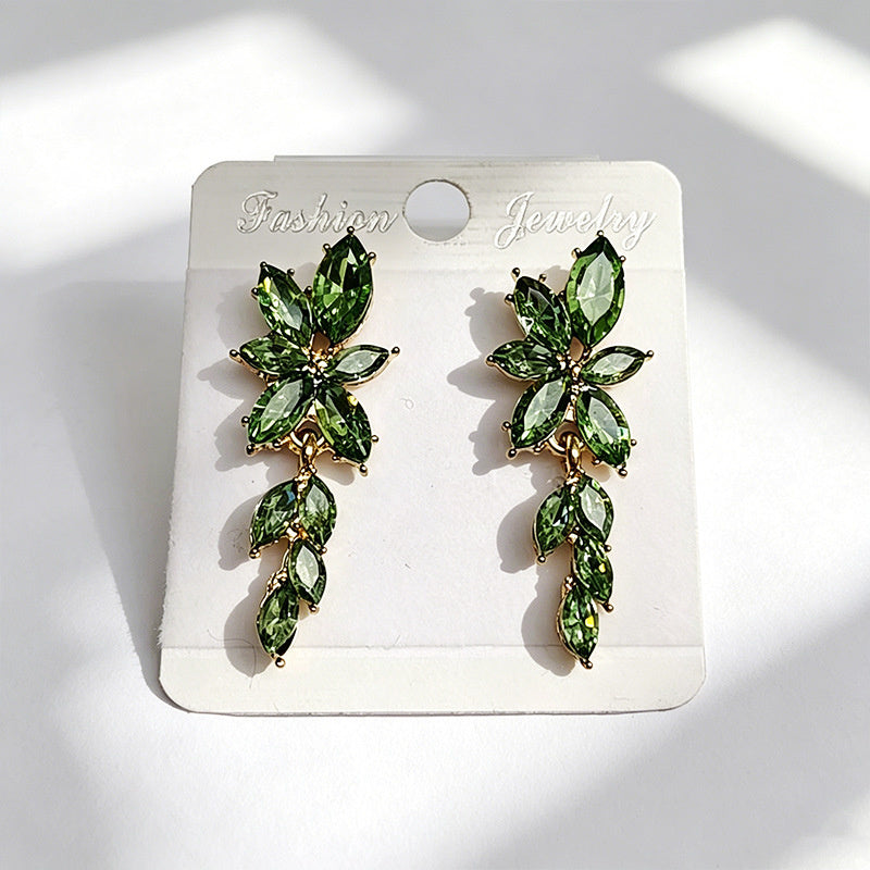 Gilt and diamond-encrusted floral earrings, long earrings for a French elegant style photo shoot or date