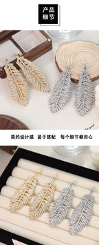 Fashionable feather for women, European American exaggerated retro cool style, stylish and unique hip-hop diamond-embellished leaf earrings