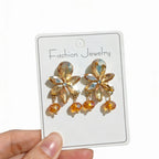 Diamond-embellished geometric tassel earrings, fashionable teardrop-shaped high-end commuter earrings