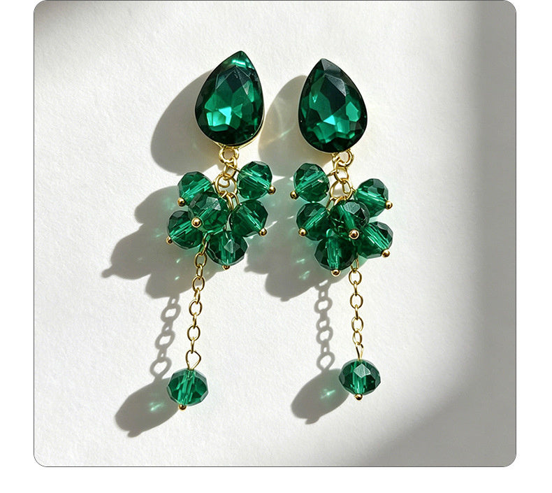 Teardrop-shaped gemstone earrings with multi-layered crystal beads and long tassel design