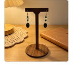 Light luxury niche black diamond pearl oval drop earrings with a French high-end feel and versatile style