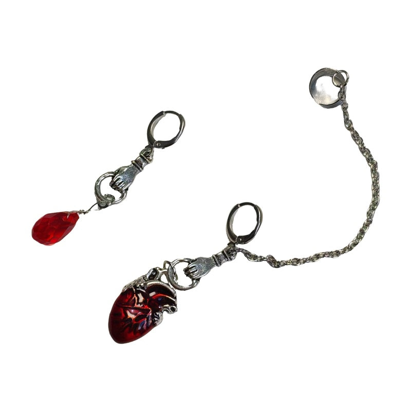 Dark-style jewelry: vintage pendant earrings, horn-shaped ruby earrings
