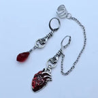 Dark-style jewelry: vintage pendant earrings, horn-shaped ruby earrings