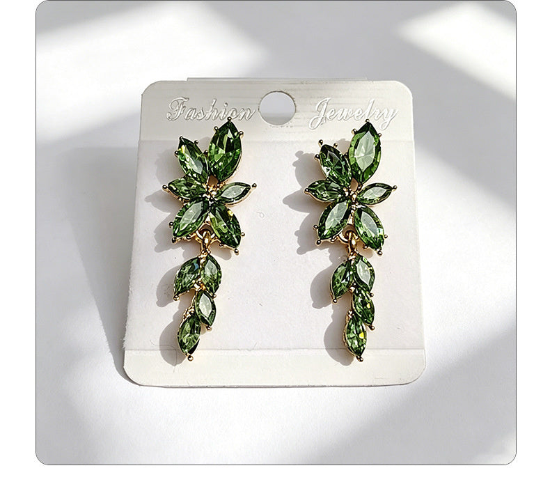 Gilt and diamond-encrusted floral earrings, long earrings for a French elegant style photo shoot or date