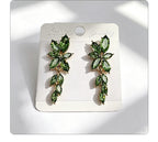 Gilt and diamond-encrusted floral earrings, long earrings for a French elegant style photo shoot or date