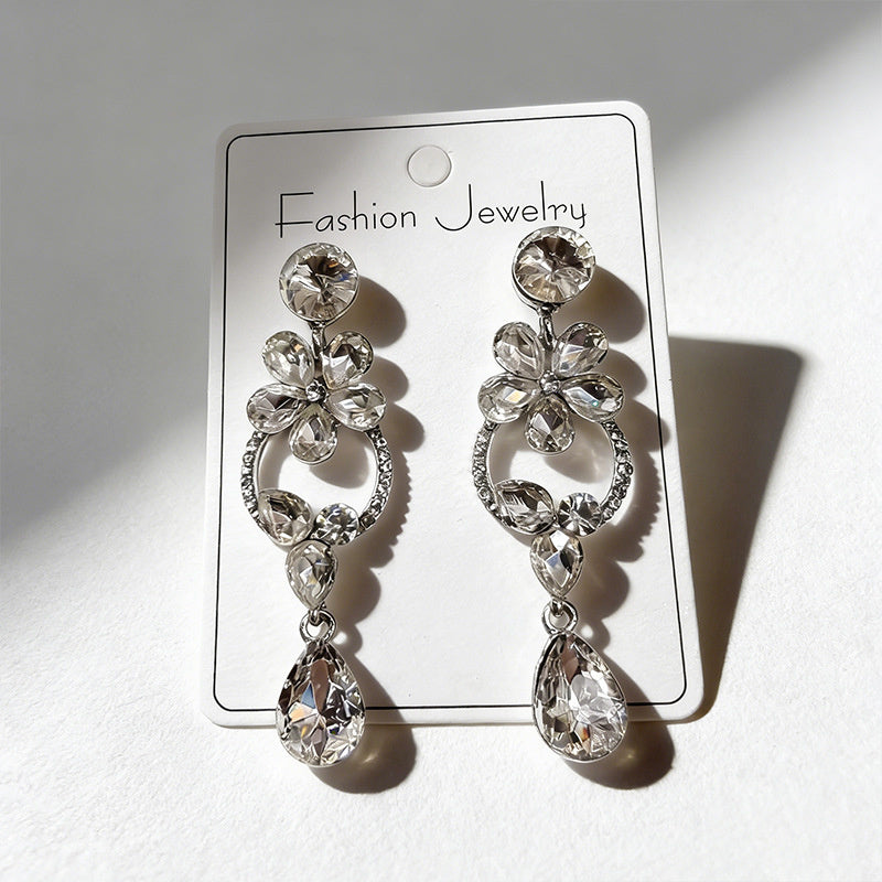 Luxurious floral with full diamond accents, long waterdrop gemstone earrings, court-style versatile earrings that enhance complexion