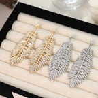 Fashionable feather for women, European American exaggerated retro cool style, stylish and unique hip-hop diamond-embellished leaf earrings