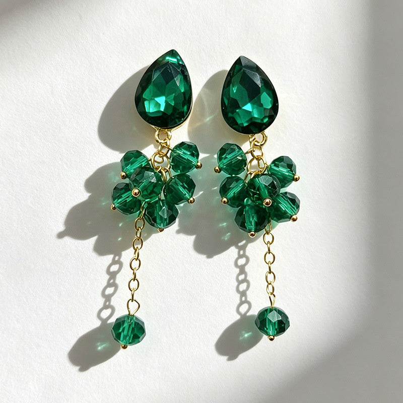 Teardrop-shaped gemstone earrings with multi-layered crystal beads and long tassel design