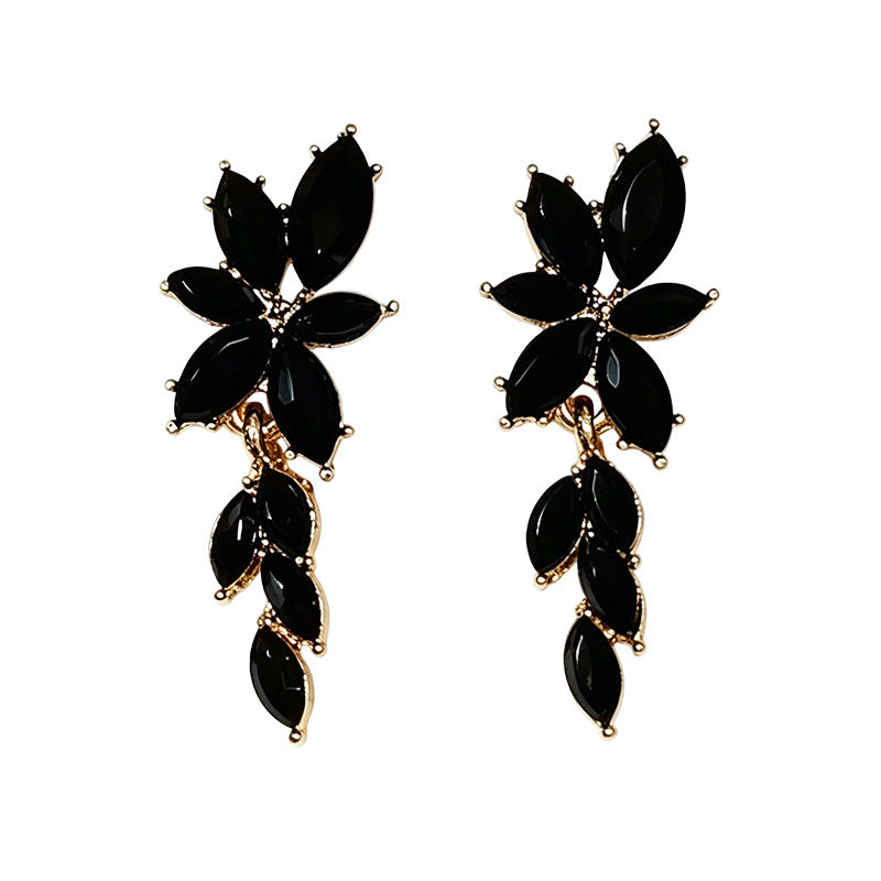 Gilt and diamond-encrusted floral earrings, long earrings for a French elegant style photo shoot or date