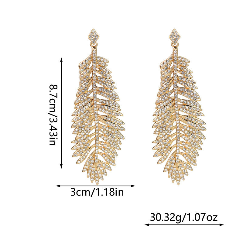Fashionable feather for women, European American exaggerated retro cool style, stylish and unique hip-hop diamond-embellished leaf earrings