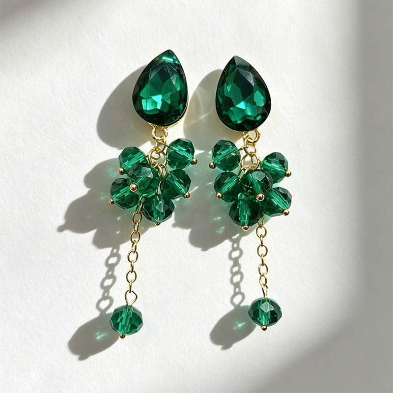 Teardrop-shaped gemstone earrings with multi-layered crystal beads and long tassel design
