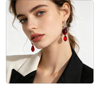 Punk-style simulated heart with distressed silver edges red crystal pendants, unique and trendy street style earrings