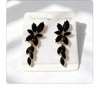 Gilt and diamond-encrusted floral earrings, long earrings for a French elegant style photo shoot or date