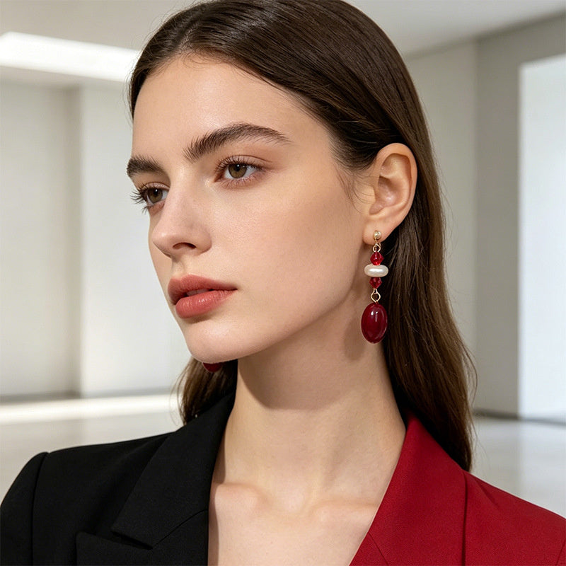 Light luxury niche black diamond pearl oval drop earrings with a French high-end feel and versatile style