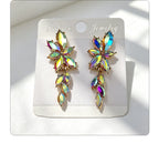 Gilt and diamond-encrusted floral earrings, long earrings for a French elegant style photo shoot or date