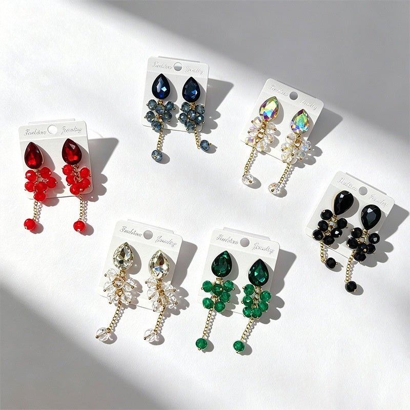 Teardrop-shaped gemstone earrings with multi-layered crystal beads and long tassel design