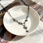 Y2K style star evil eye pendant necklace, exquisite and elegant niche collarbone chain, light luxury fashion accessory