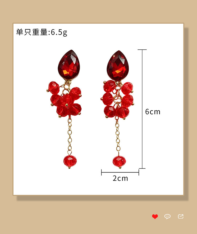 Teardrop-shaped gemstone earrings with multi-layered crystal beads and long tassel design