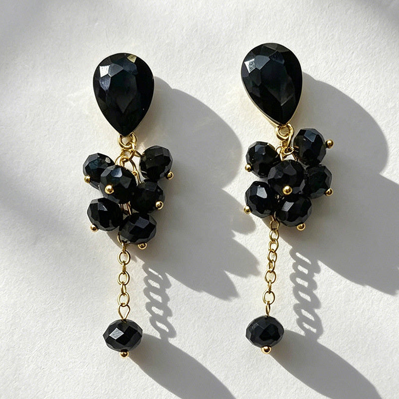 Teardrop-shaped gemstone earrings with multi-layered crystal beads and long tassel design