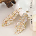 Fashionable feather for women, European American exaggerated retro cool style, stylish and unique hip-hop diamond-embellished leaf earrings