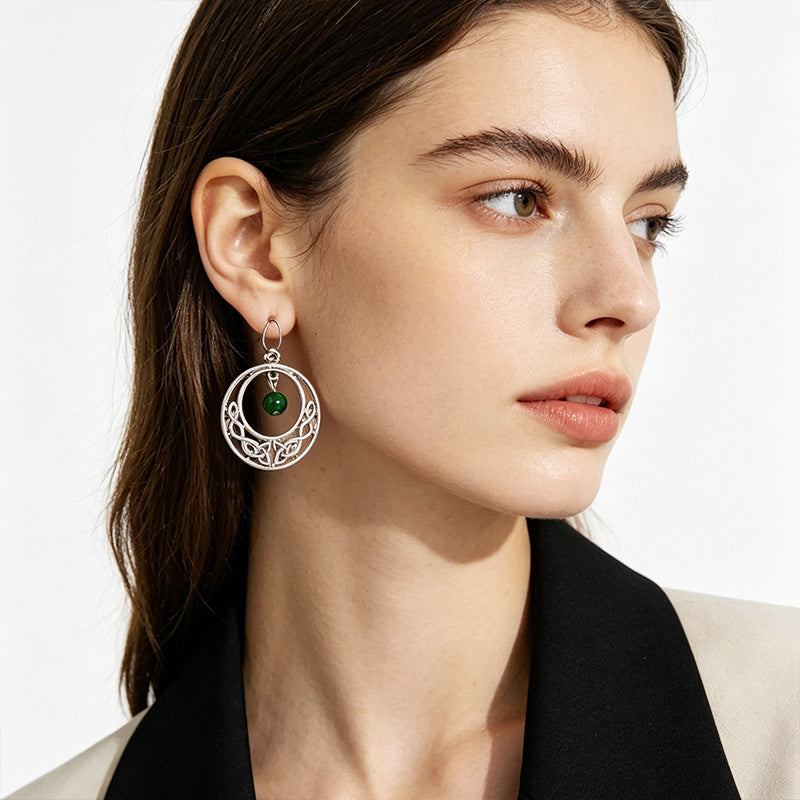 Irish-style woven pattern hollow earrings with distressed silver hoops and green jade beads, versatile for casual vacations