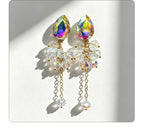Teardrop-shaped gemstone earrings with multi-layered crystal beads and long tassel design