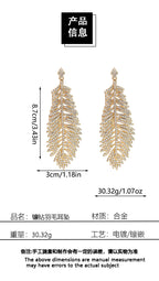Fashionable feather for women, European American exaggerated retro cool style, stylish and unique hip-hop diamond-embellished leaf earrings