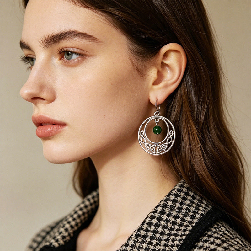 Irish-style woven pattern hollow earrings with distressed silver hoops and green jade beads, versatile for casual vacations