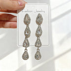 Tassel with a high-end feel, full of diamonds, water drop design, elegant earrings for parties