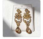 Luxurious floral with full diamond accents, long waterdrop gemstone earrings, court-style versatile earrings that enhance complexion