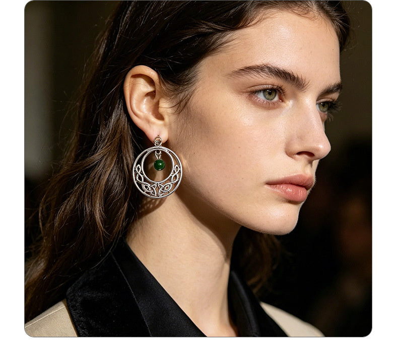 Irish-style woven pattern hollow earrings with distressed silver hoops and green jade beads, versatile for casual vacations
