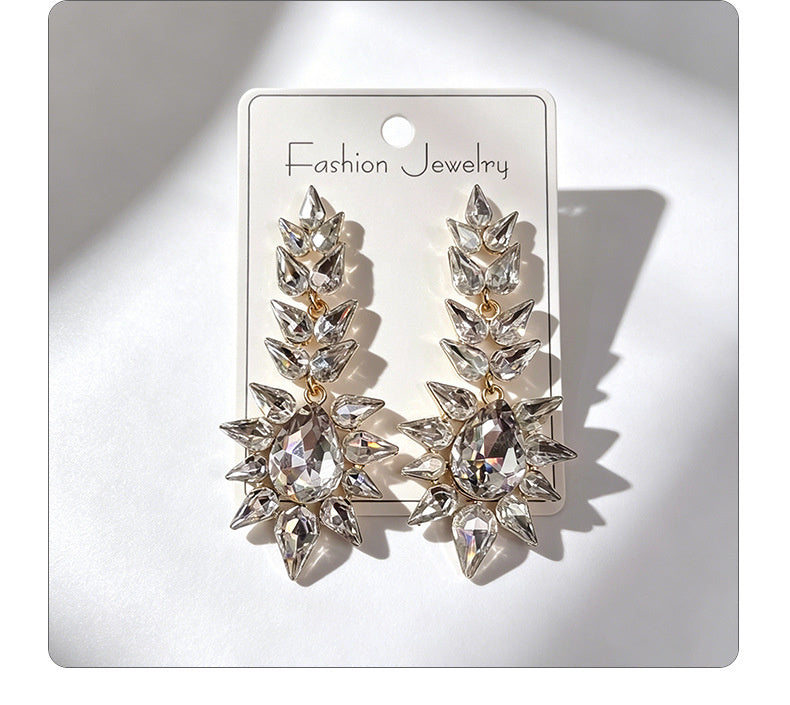 Black rhinestone flame earrings with an exaggerated, grand, and high-end feel