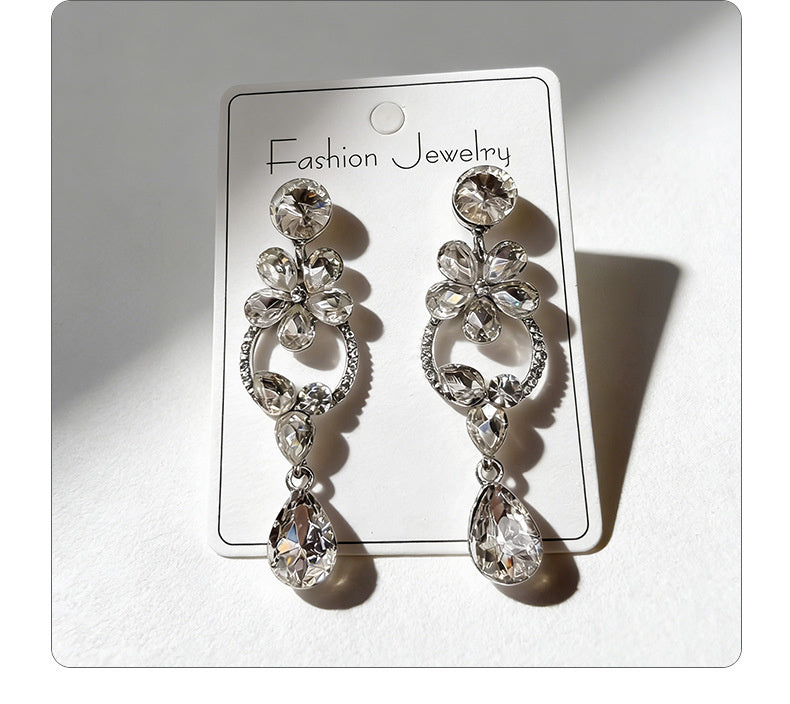 Luxurious floral with full diamond accents, long waterdrop gemstone earrings, court-style versatile earrings that enhance complexion
