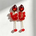 Teardrop-shaped gemstone earrings with multi-layered crystal beads and long tassel design