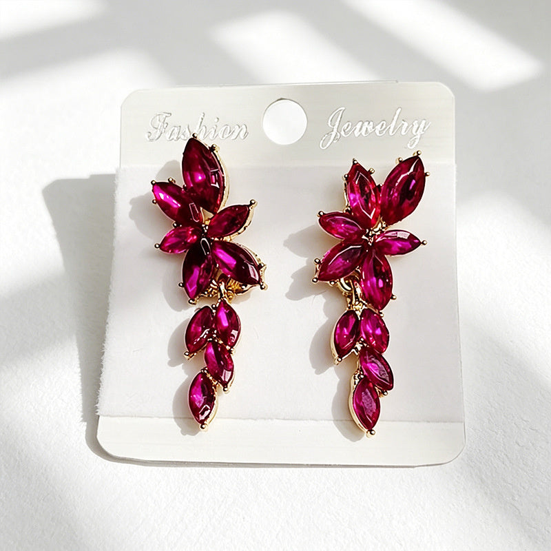 Gilt and diamond-encrusted floral earrings, long earrings for a French elegant style photo shoot or date