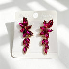 Gilt and diamond-encrusted floral earrings, long earrings for a French elegant style photo shoot or date