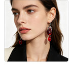Punk-style simulated heart with distressed silver edges red crystal pendants, unique and trendy street style earrings